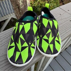 Speedo Kids Beach Booties in a Black and Neon Green Geometric Pattern